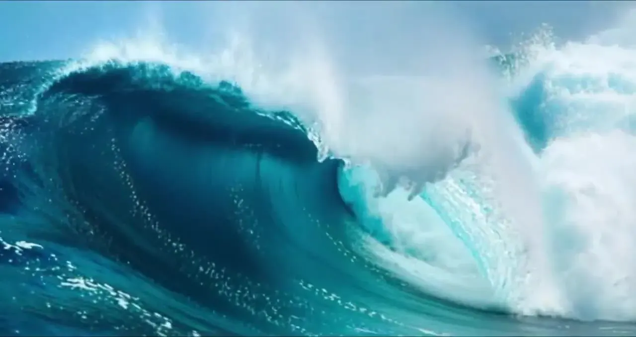 Kling AI image to video result: an ocean wave photo animated into a curling, breaking barrel