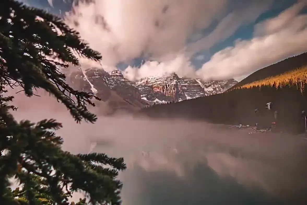 Alpine lake with morning mist animated from a landscape photo